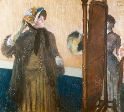 Edgar Degas, La sombrerería. 1.882. Metropolitan Museum of Art. Obsérvese la dama ante un espejo psyché. 